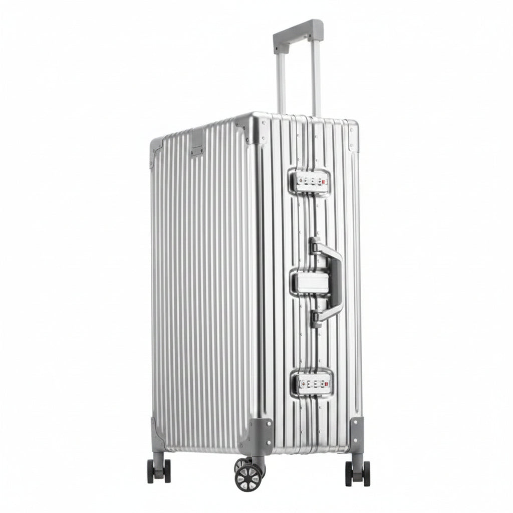 Silver suitcase with wheels on a white background
